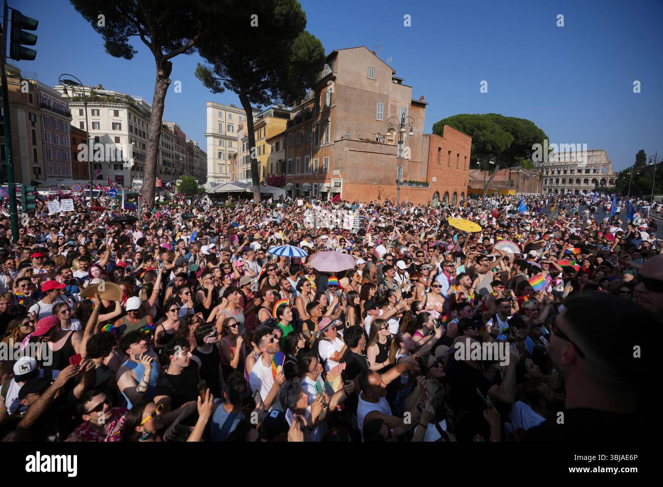 Parade In Rome People parade in front of the Rome's Colosseum during a Pride parade ...