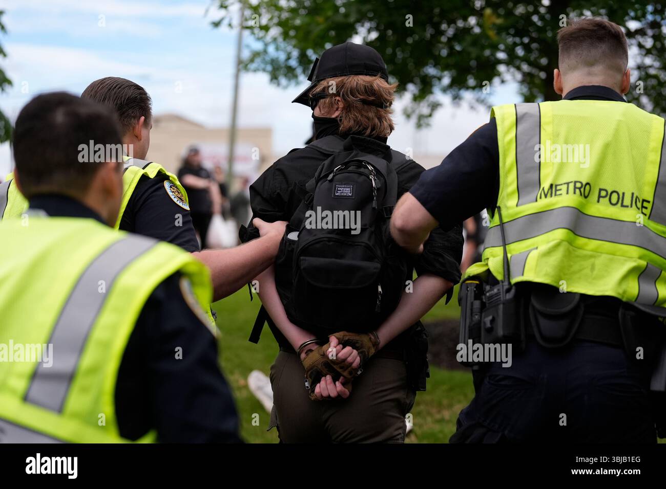 A man is arrested by Metro Nashville Police Department officers as he ...