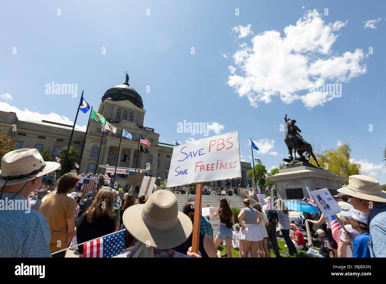 Helena, Montana, USA. 14th June, 2025. Demonstrators gather at the Montana State Capitol for the “No Kings” rally. The national day of action and mass mobilization was organized by the 50501 movement and local organizations in response to perceived authoritarian actions of the Trump administration. Credit: Paul Christian Gordon/Alamy Live News Stock Photo