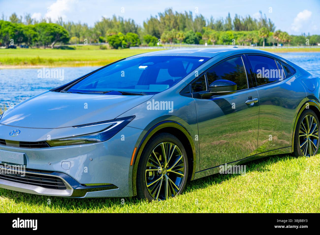 Sunrise, FL, USA - June 13, 2025: 2025 Toyota Prius hybrid gas electric vehicle. Guardian Gray. Stock Photo