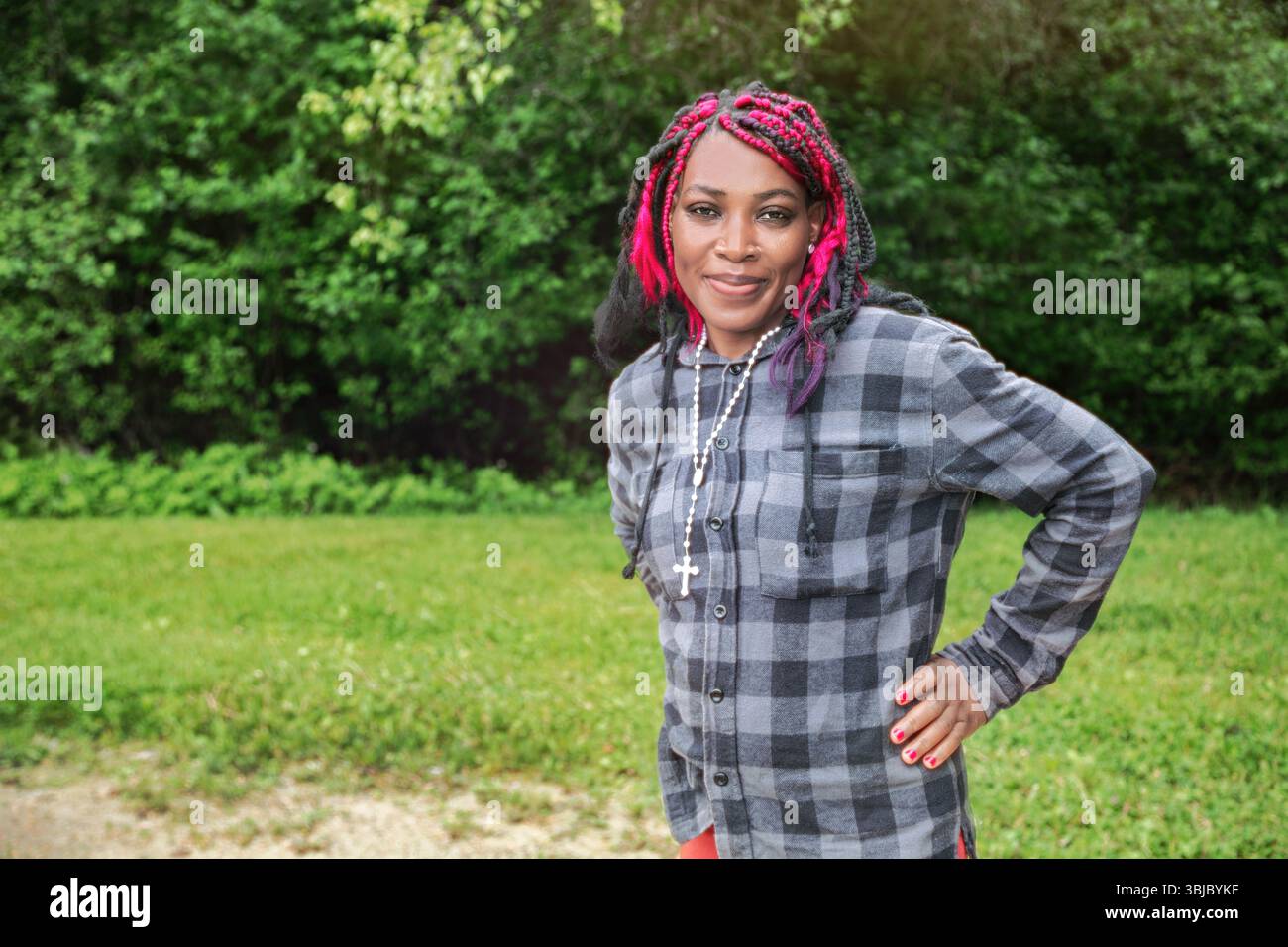 Female wearing plaid shirt hi-res stock photography and images - Alamy