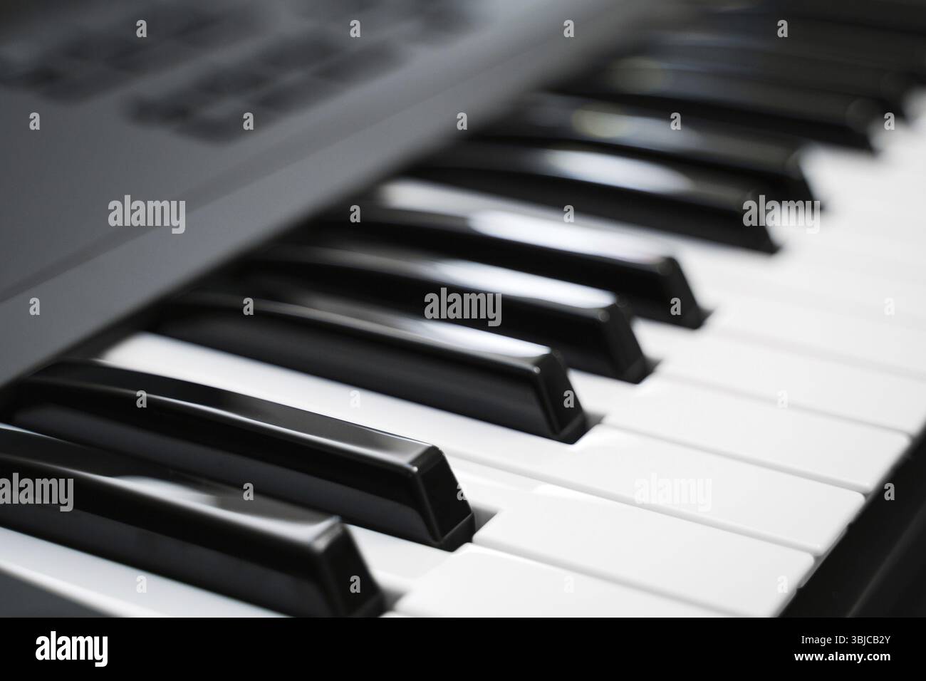 Professional midi keyboard synthesizer with knobs and controllers Stock Photo