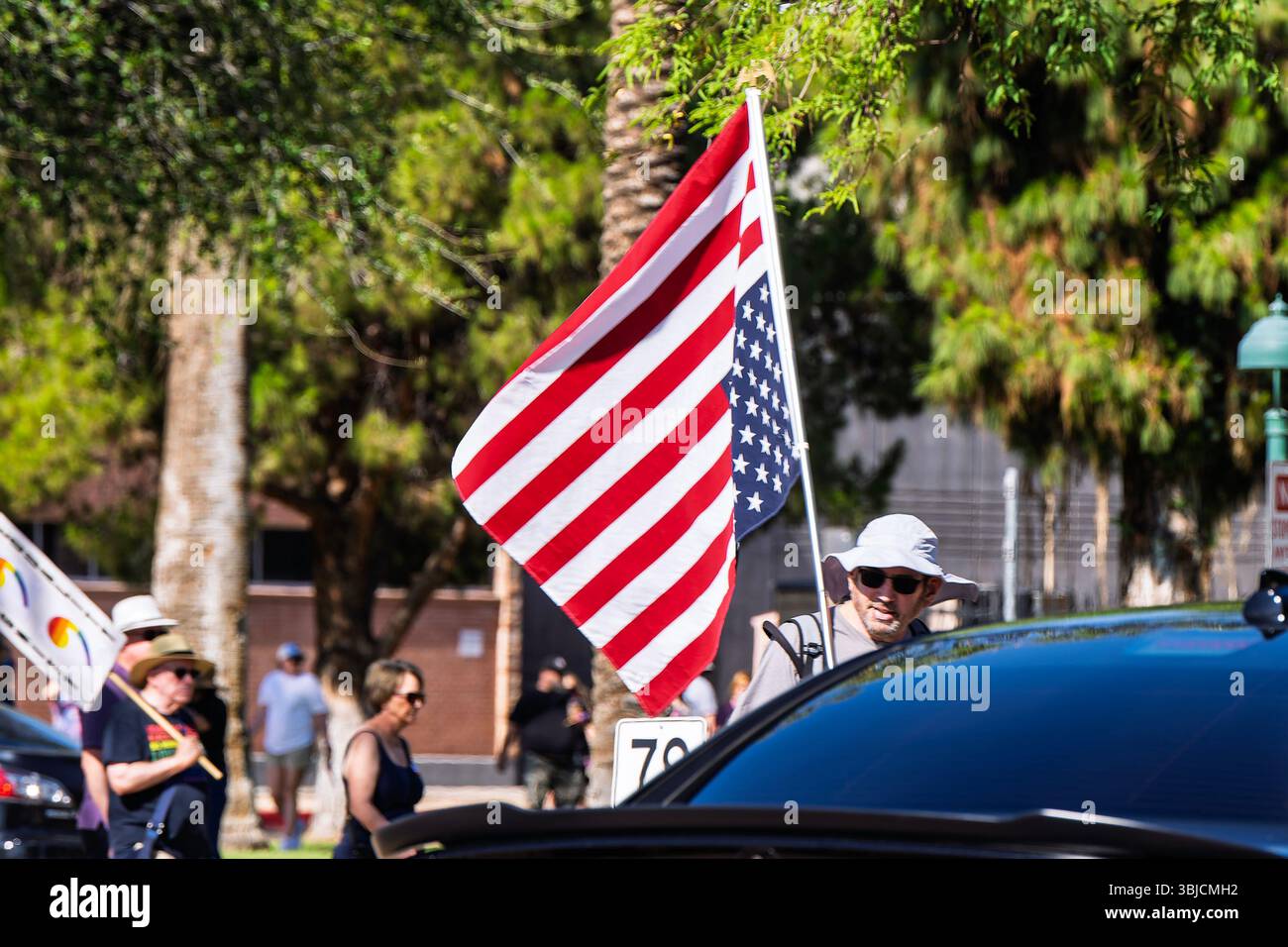 Protesters attending the NO KINGS protest held at the Arizona State ...
