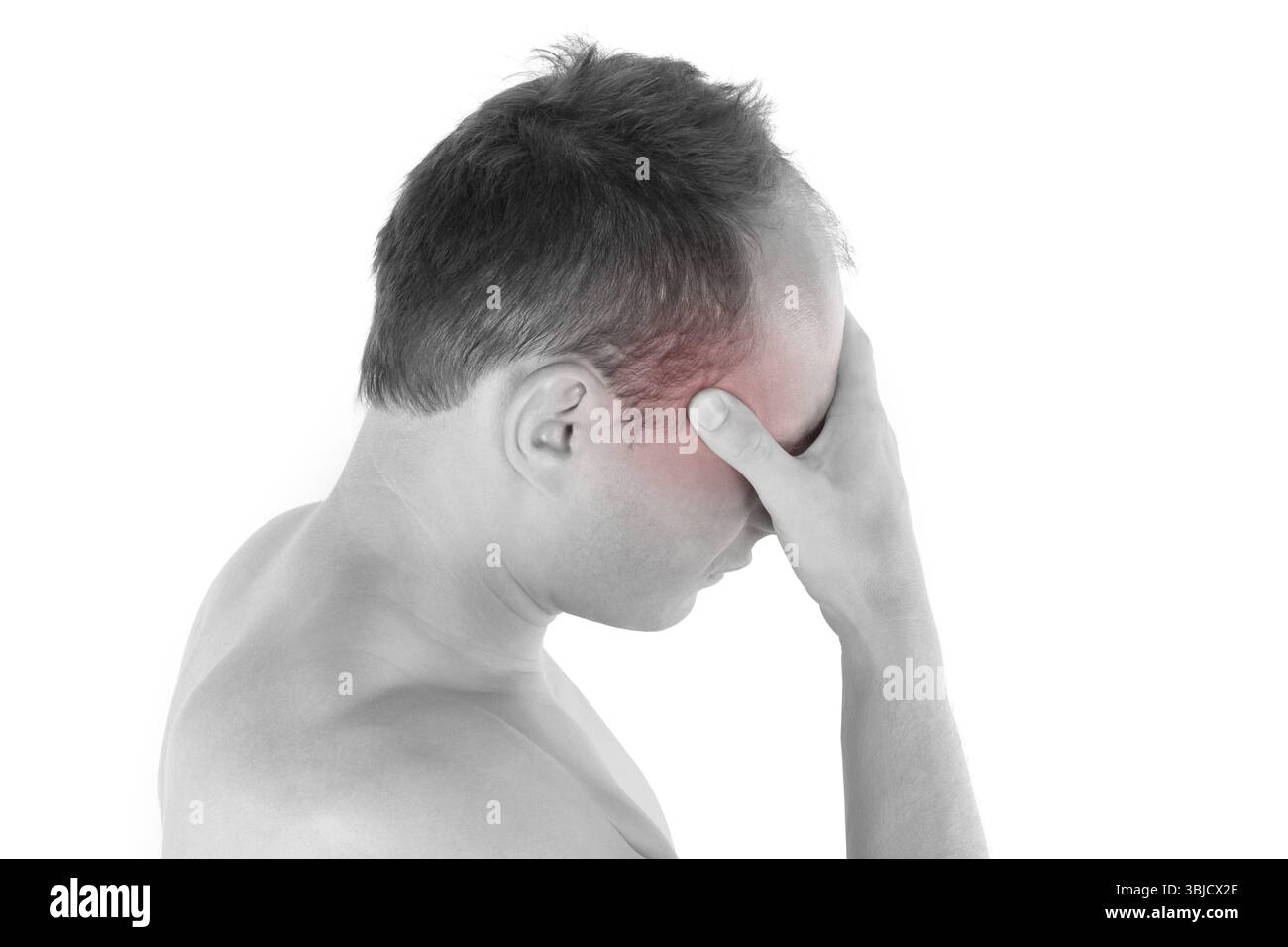 Headache. Young man touching his head with highlighted pain area isolated on white background. Headache and migraine concept Stock Photo