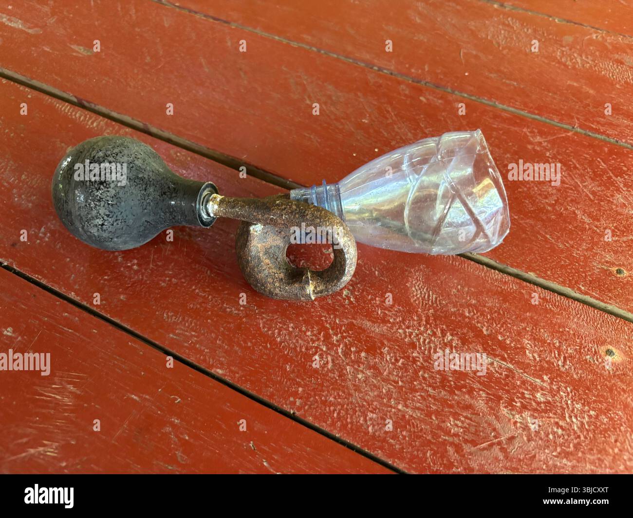 Tube bulb horn with makeshift plastic bottle, Tetepare, Western Province, Solomon Islands - Smartphone Captured Stock Image
