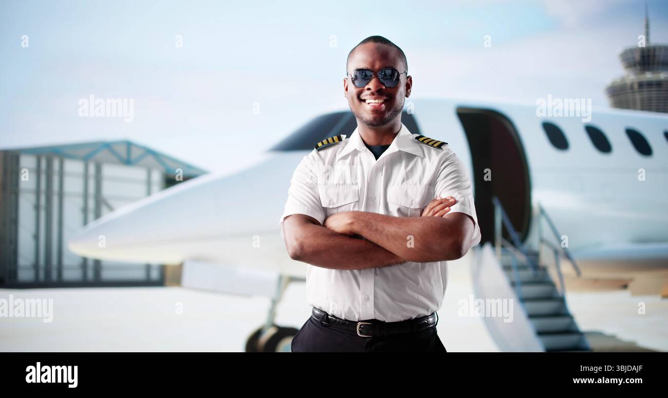 Smiling Pilot Prepares For Departure In His Private Jet Stock Photo