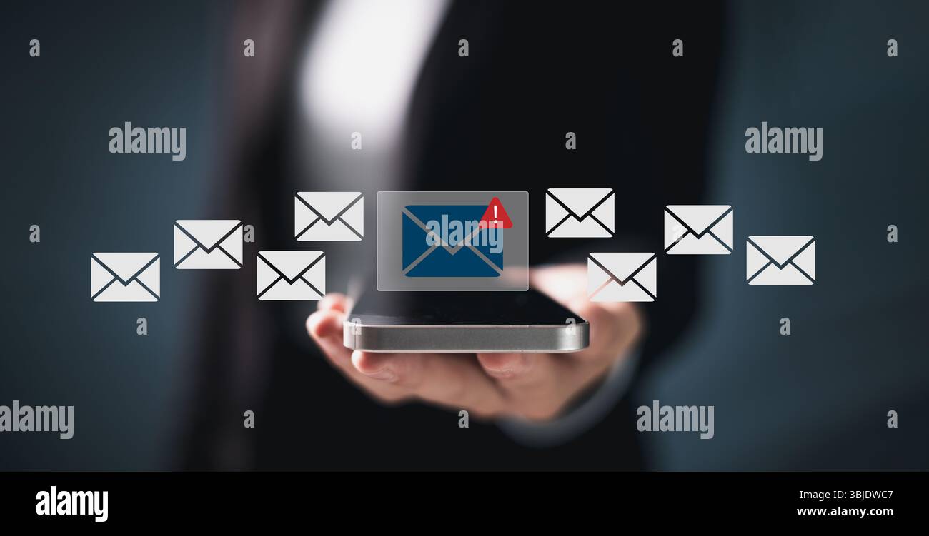 Phishing email alert concept with person using smartphone while ...