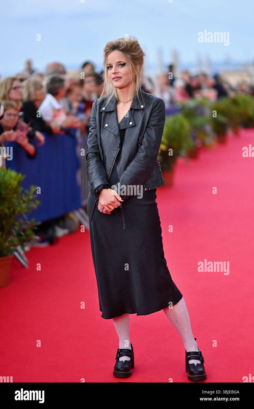 Cabourg, France. 14th June, 2025. Charlotte Colbert attends the red ...