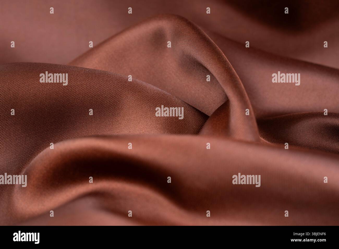Dark brown color silk texture, Abstract as background. Stock Photo