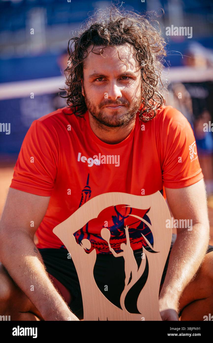 Marco Trungelliti (ARG) with his trophy during the mens finals at Open ...