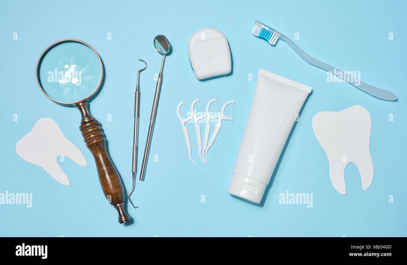 Set of oral hygiene products and tools, tube of toothpaste, dental ...