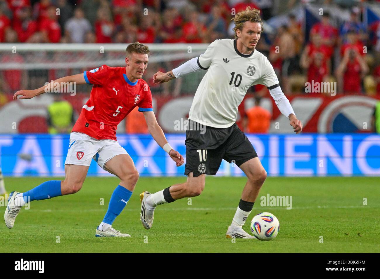 L-R Stepan Chaloupek (GER) and Nick Woltemade (CZE) in action during ...
