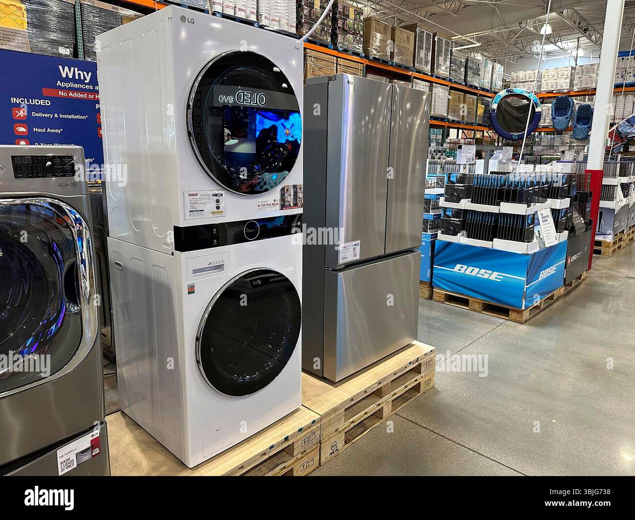 Appliances stand on display in a Costco warehouse Wednesday, June 11 ...