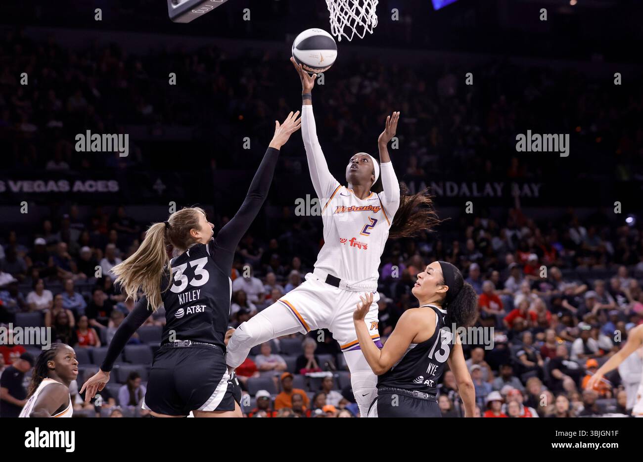 Phoenix Mercury guard Kahleah Copper (2) shoots a layup between Las