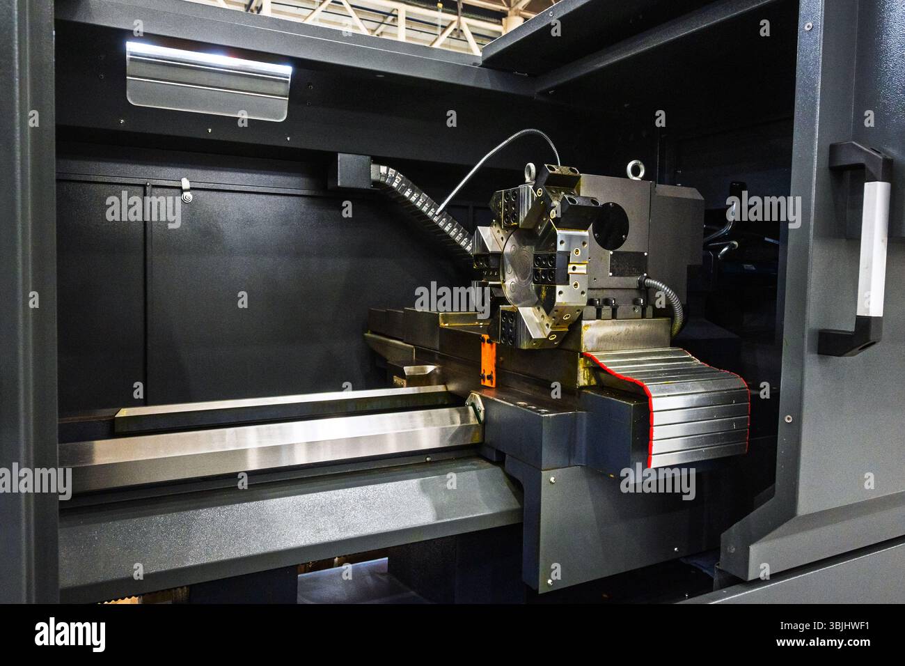 Interior view of a modern industrial CNC machine, revealing the ...