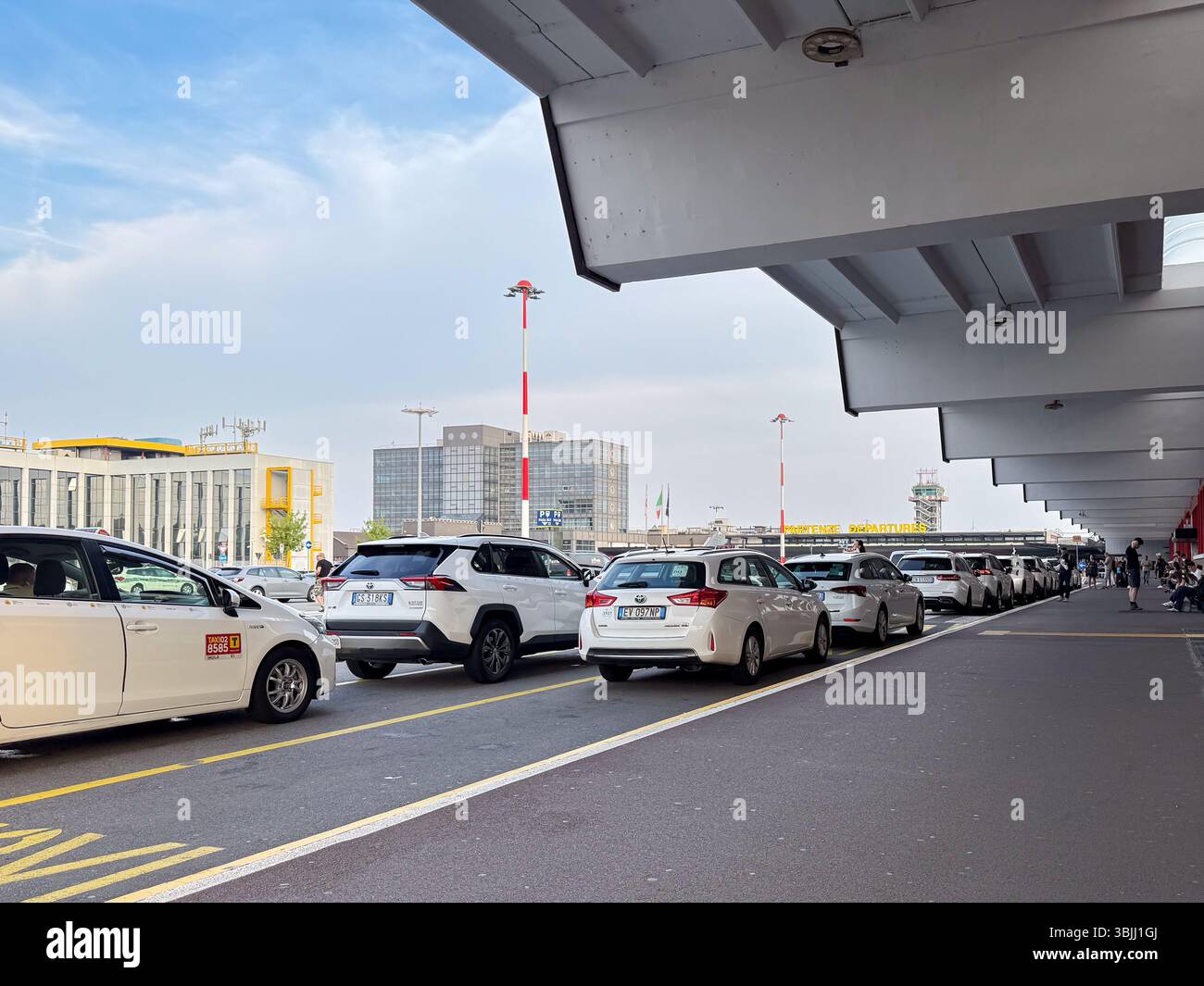 Taxis Waiting Outside Milan Malpensa Airport Terminal Stock Photo