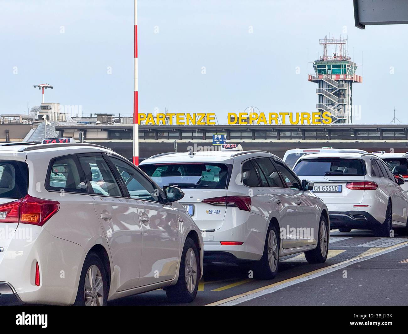 Taxis Waiting Outside Milan Malpensa Airport Terminal Stock Photo