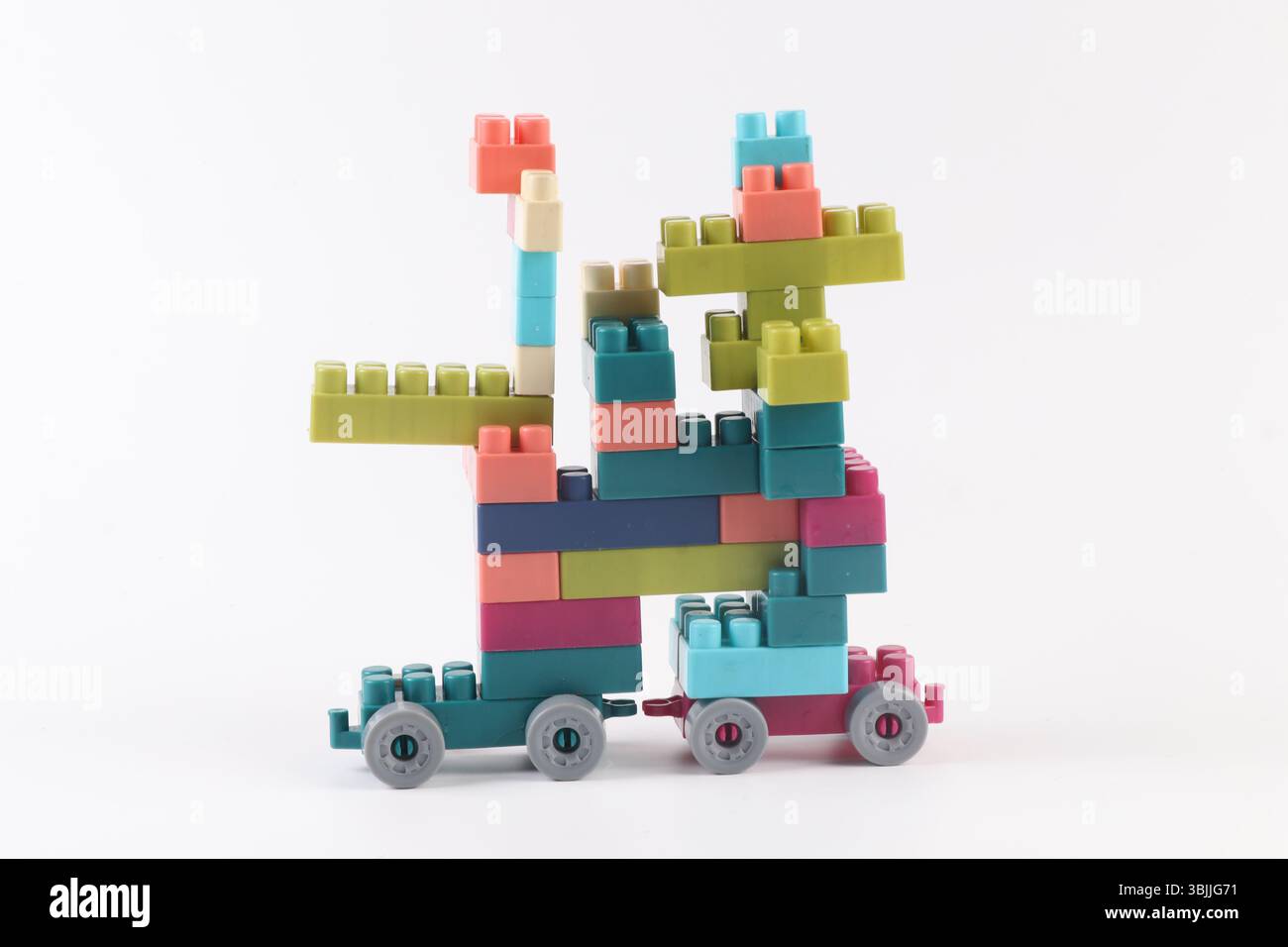 Plastic building blocks form vehicle on white background Stock Photo