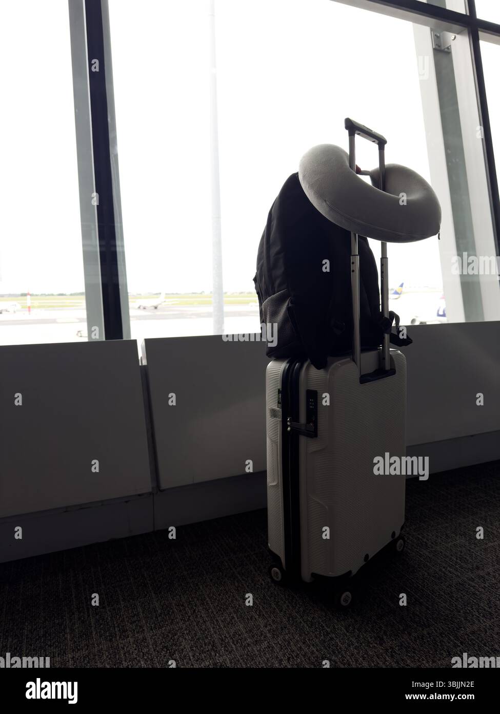Lonely suitcase and luggage in the airport waiting area - Smartphone Captured Stock Image Lonely suitcase and luggage in the airport waiting area - Smartphone Captured Stock Image