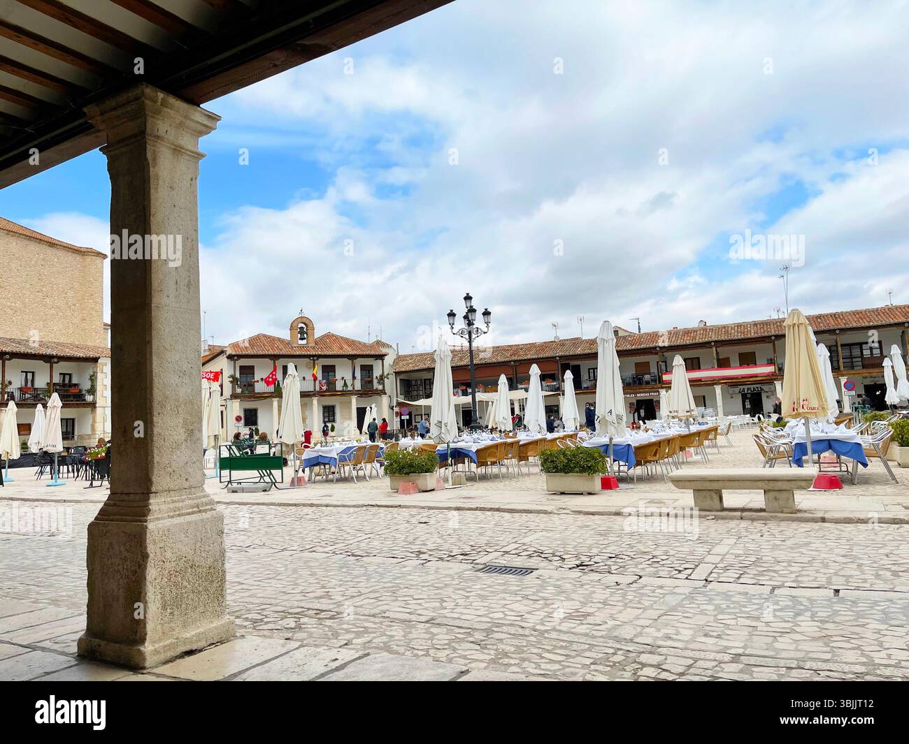 Terrace of restaurant. Plaza Mayor, Colmenar de Oreja, Madrid province, Spain. - Smartphone Captured Stock Image