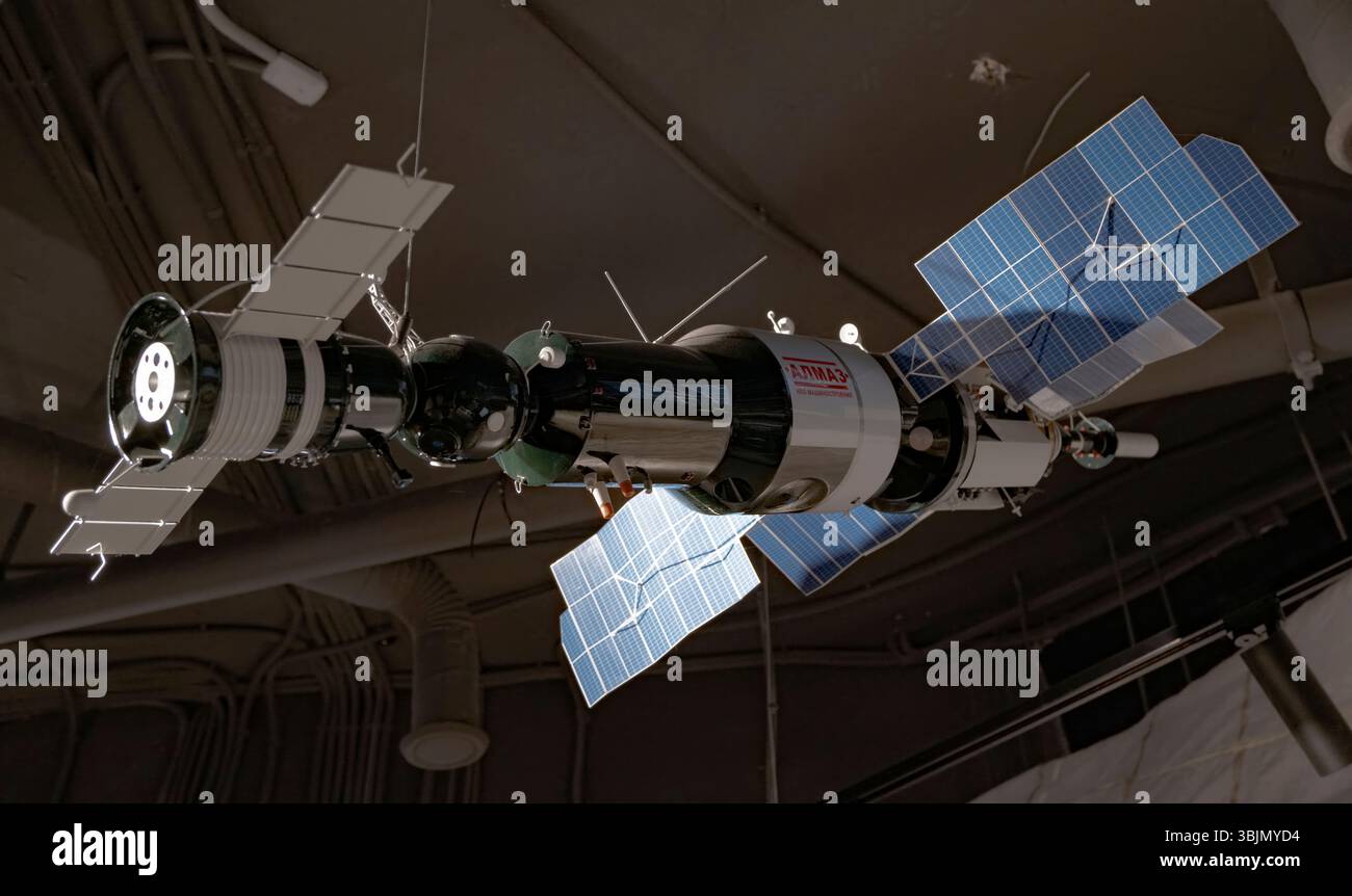 A model of a space satellite with solar panels and parts demonstrated in a planetarium Stock Photo
