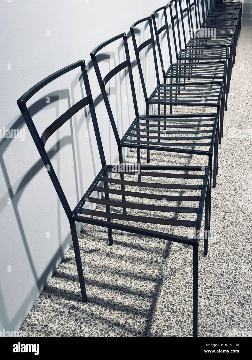 Close Up of metal Chairs at Christies auction house, New York City, USA, 2015 - Smartphone Captured Stock Image