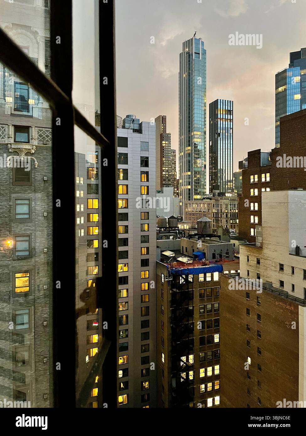 Skyscrapers in nomad as seen from a Murray hill apartment window, New York City, United States, 2025 - Smartphone Captured Stock Image