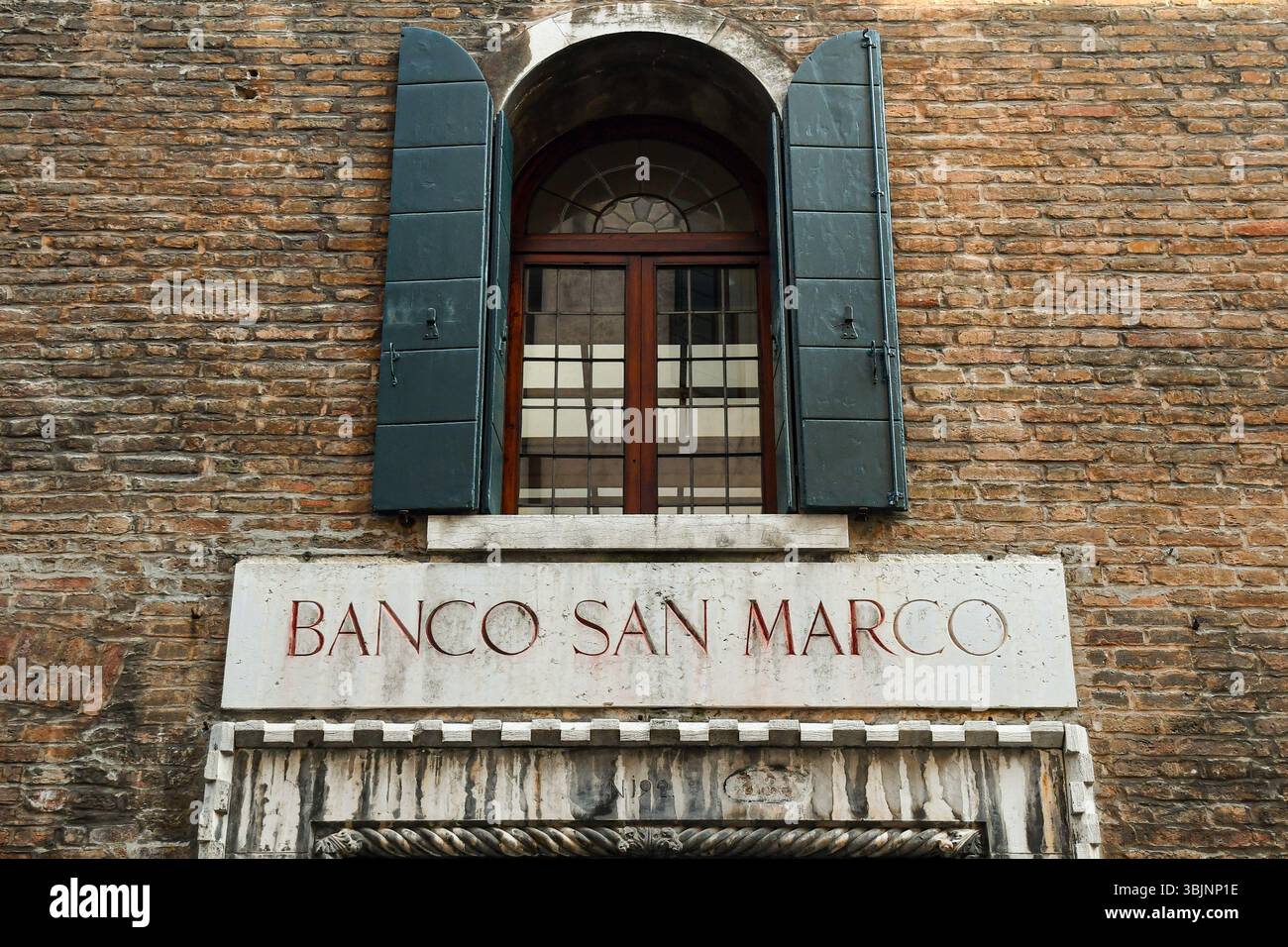 Sign of the former Banco San Marco (St Mark's Bank), founded in 1895, since 2017 Venetian brand of the commercial network Banco BPM Italia, Venice Stock Photo