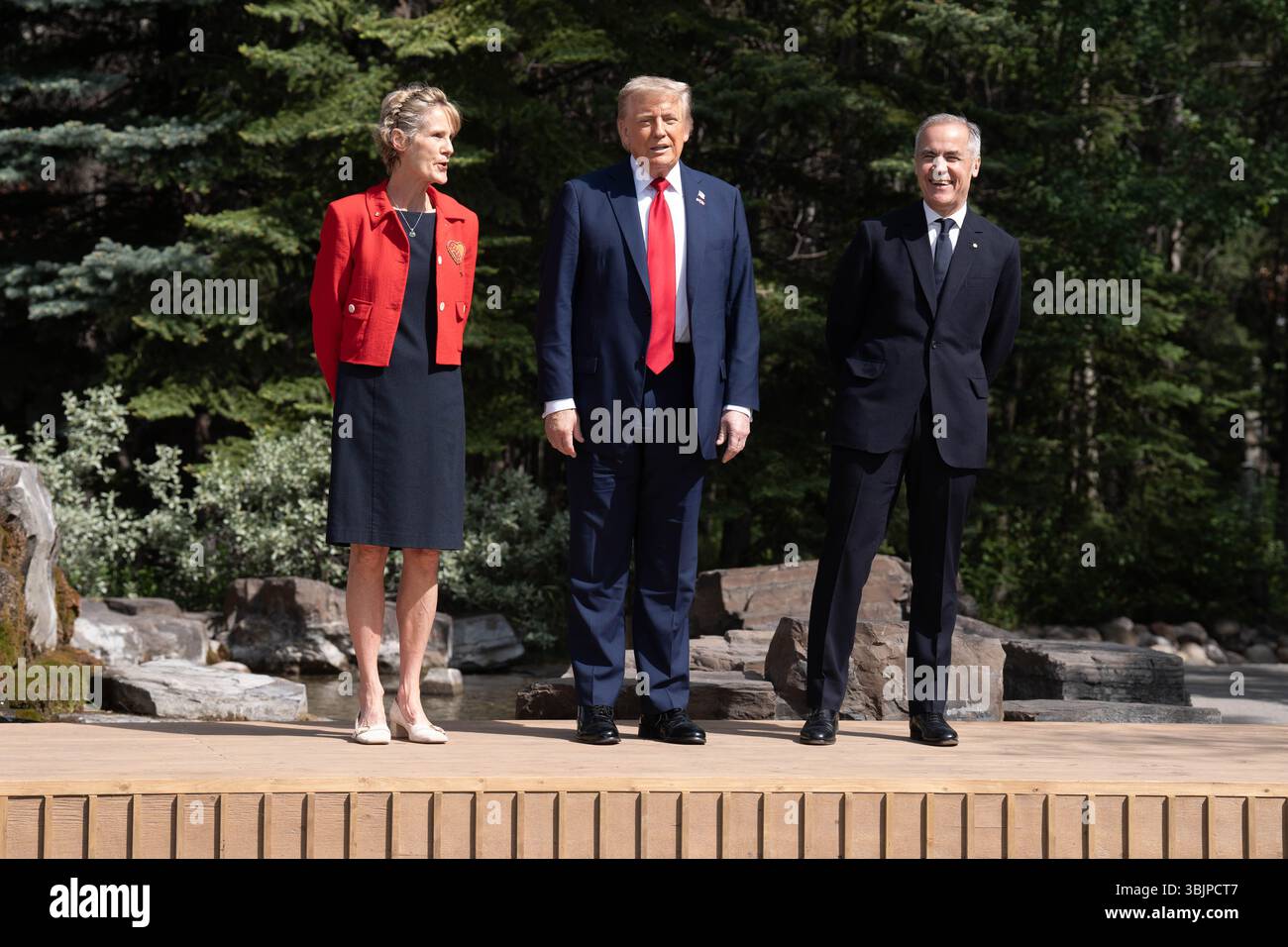 US President Donald Trump poses for a photo with Diana Fox Carney and ...