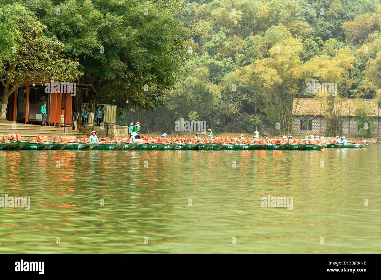 Landscape on a boat tour in Trang An, a Unesco World Heritage Site in Vietnam Stock Photo