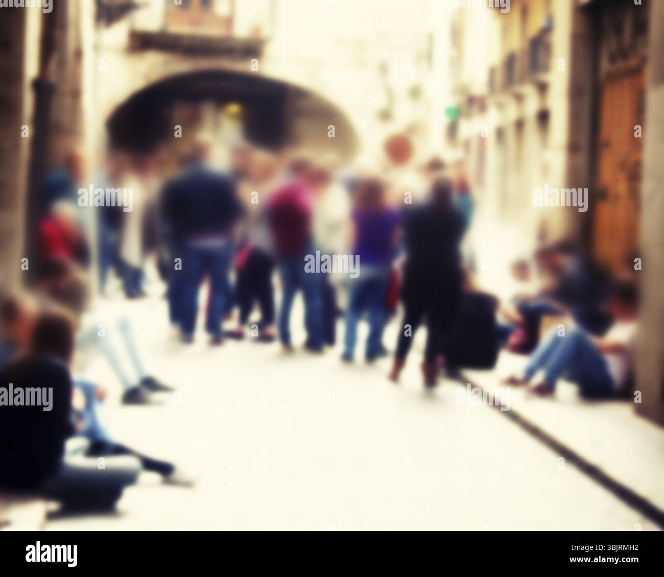 Strong blur, anonymous people on streets of Europe. Crowds of tourists in old city Stock Photo