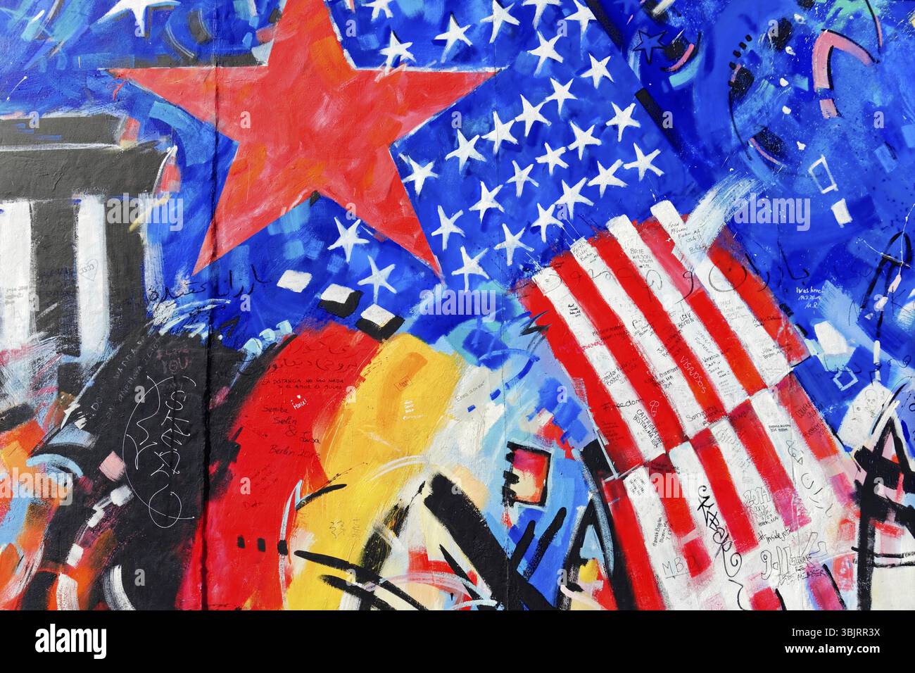 Modern art with American flag and red stars, dominating blue and bright  colours, graffiti on the Berlin Wall in the East Side Gallery, Berlin,  Germany Stock Photo - Alamy, image size:1300x956