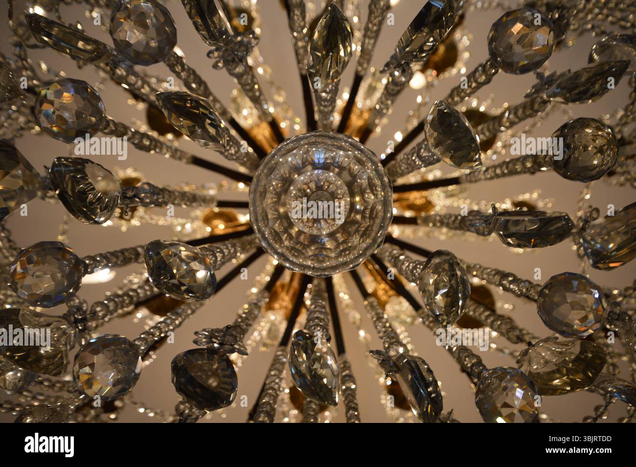 Crystal chandelier in the Gold Room at Polesden Lacey, Surrey, England—believed to be composed of around 4,000 individual crystals (unverified). Stock Photo