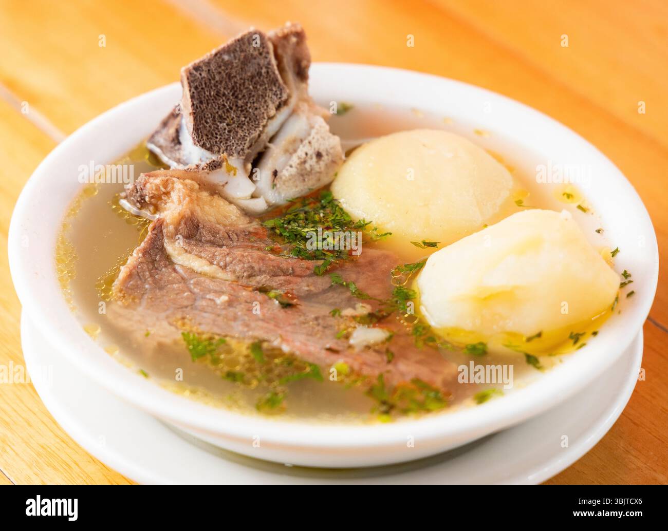 Traditional colombian breakfast - Beef rib broth with potatoes Stock ...