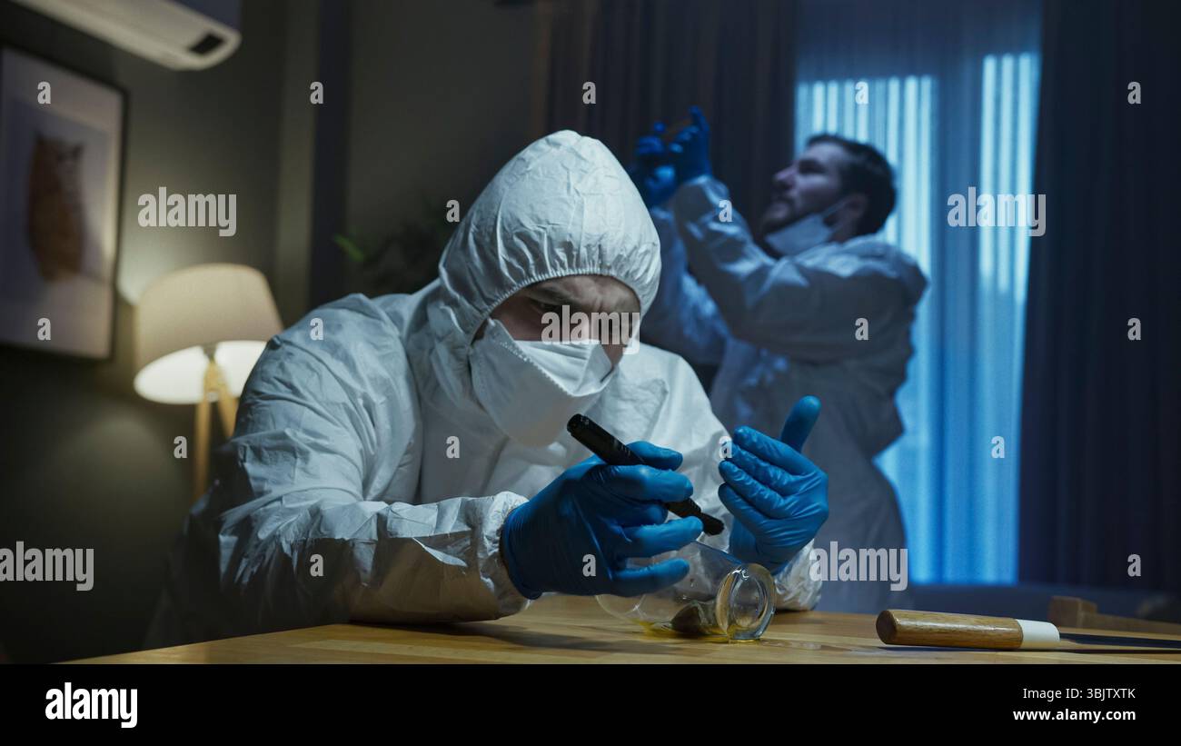 Forensic hazmat suits hi-res stock photography and images - Alamy
