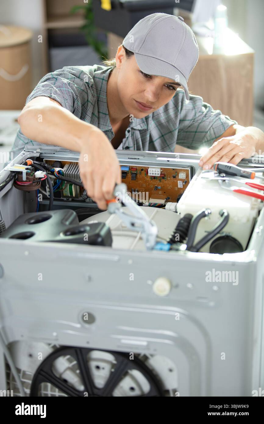 Woman washing machine defect hi-res stock photography and images - Alamy
