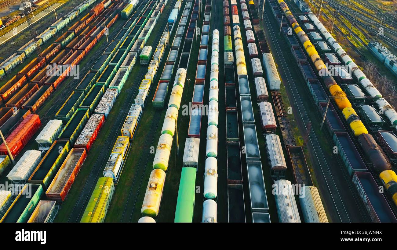 Aerial view of train yard with colorful cargo containers. An aerial ...