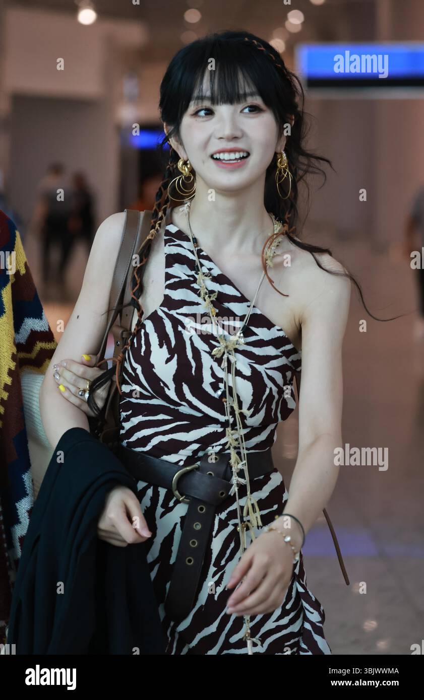 Chinese actress Tian Xiwei appears at the airport in Shanghai, China ...
