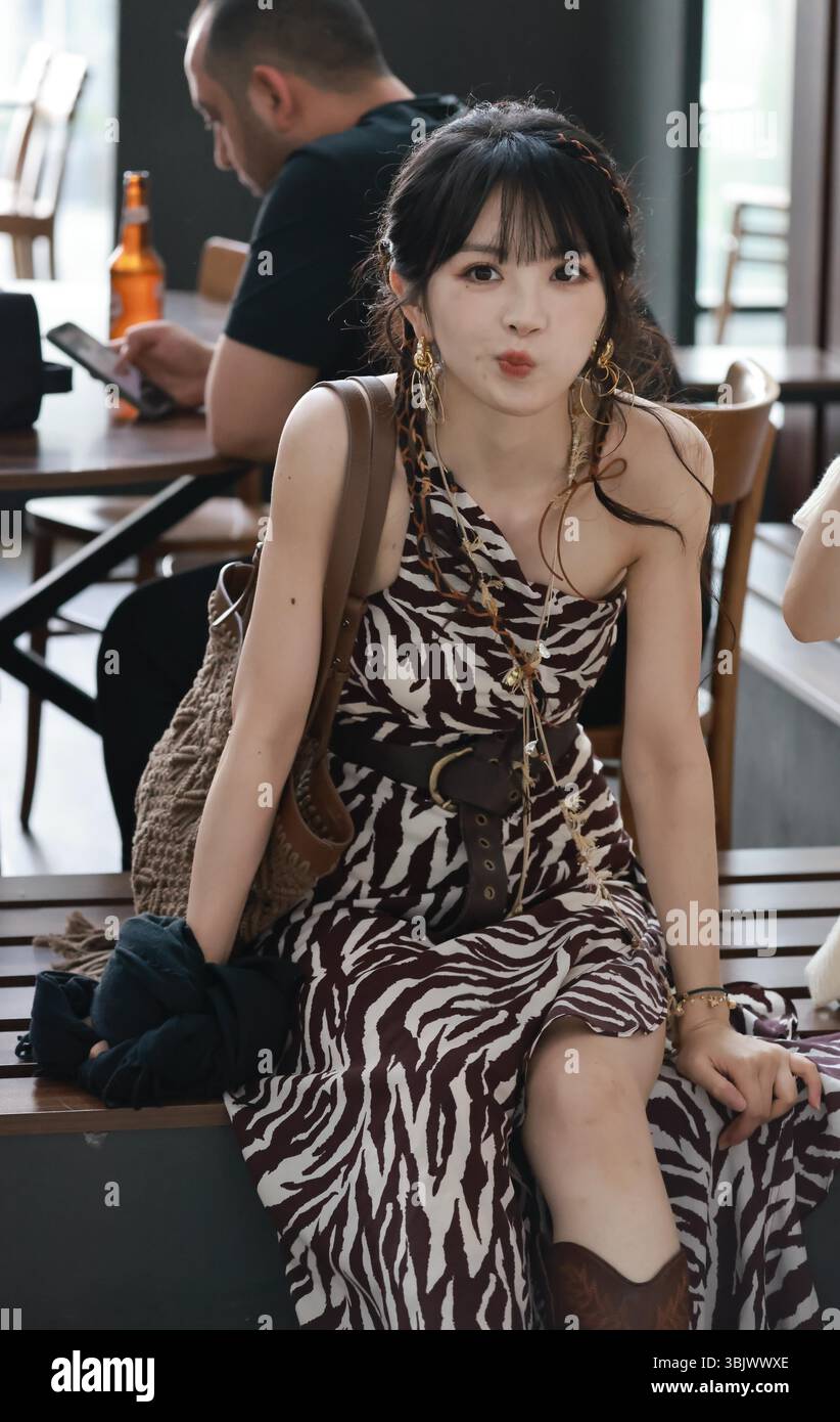 Chinese actress Tian Xiwei appears at the airport in Shanghai, China ...