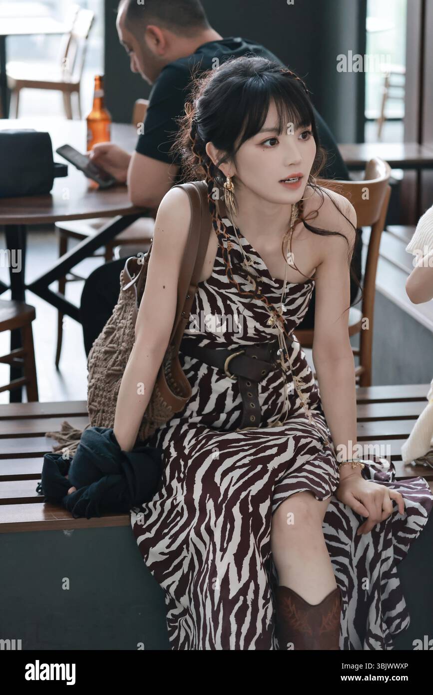 Chinese actress Tian Xiwei appears at the airport in Shanghai, China ...