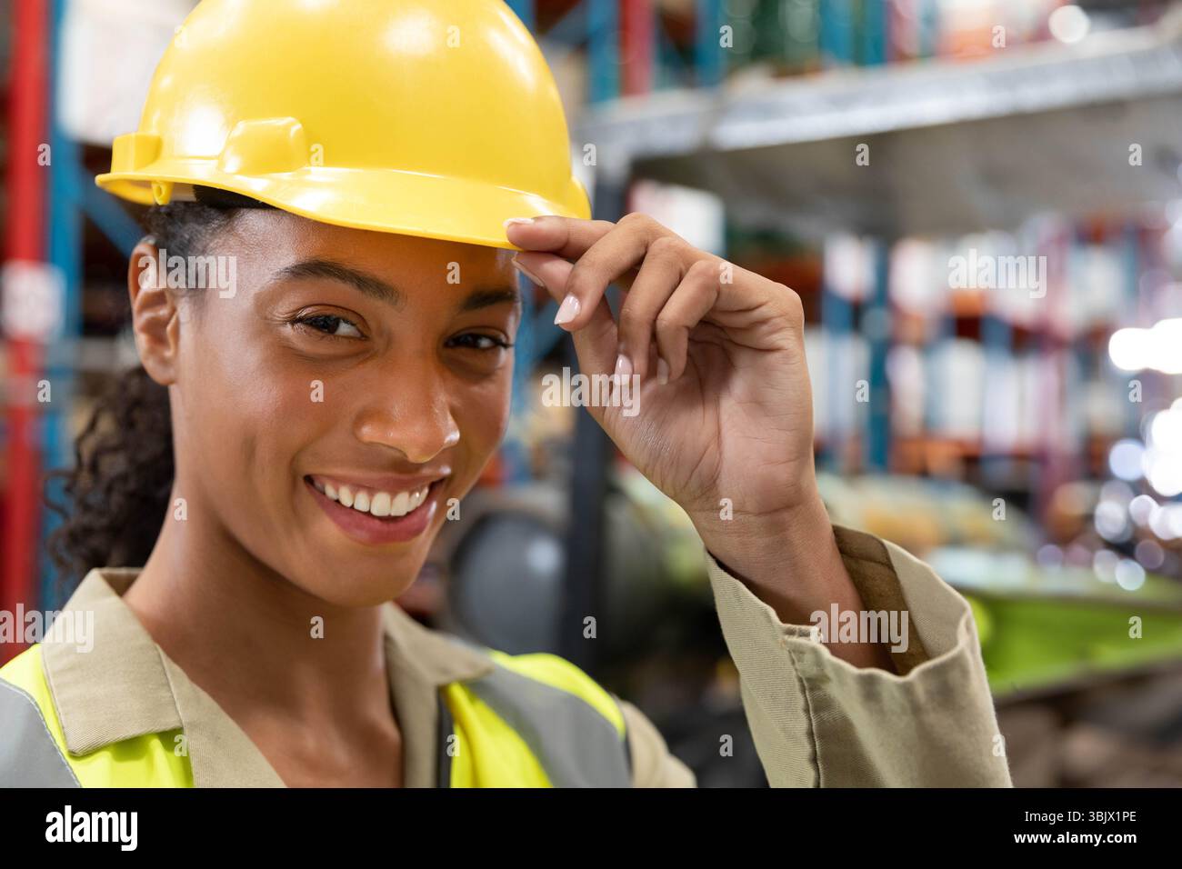Woman wearing hi vis vest hard hat hi-res stock photography and images ...