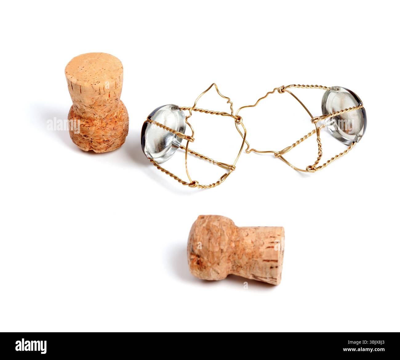 Two corks from champagne wine and muselets Stock Photo