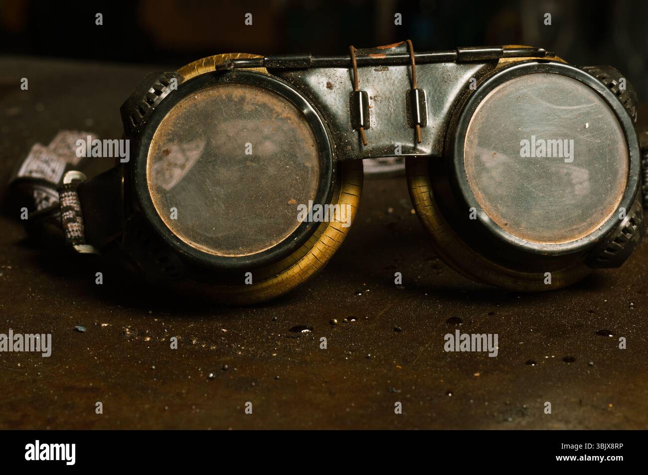 Googles of a factory worker Stock Photo