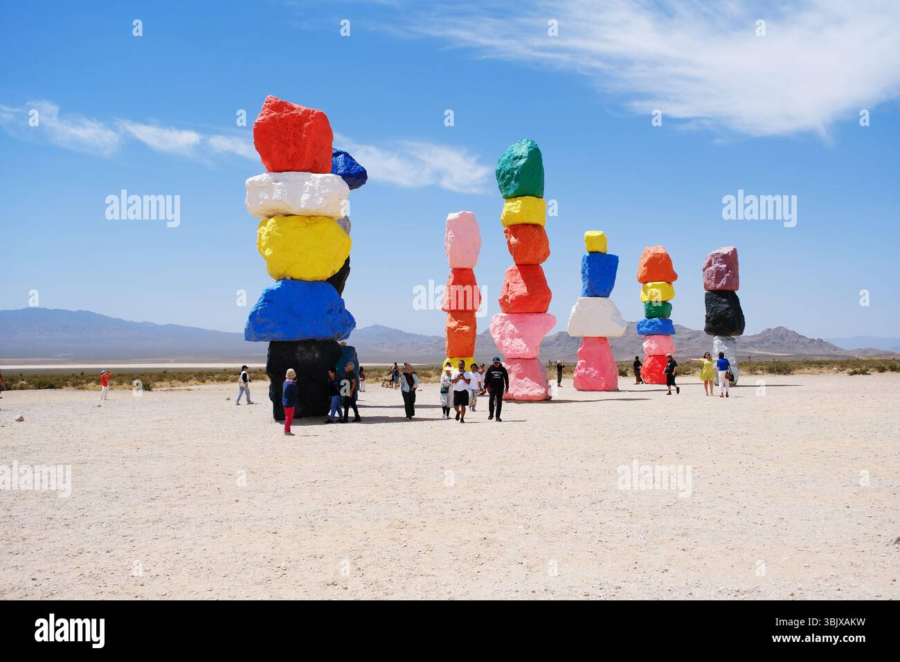 Las Vegas,Nevada,USA-June 18th 2024: Seven Magic Mountains colorful rock art installation in the Nevada desert.with tourist Stock Photo