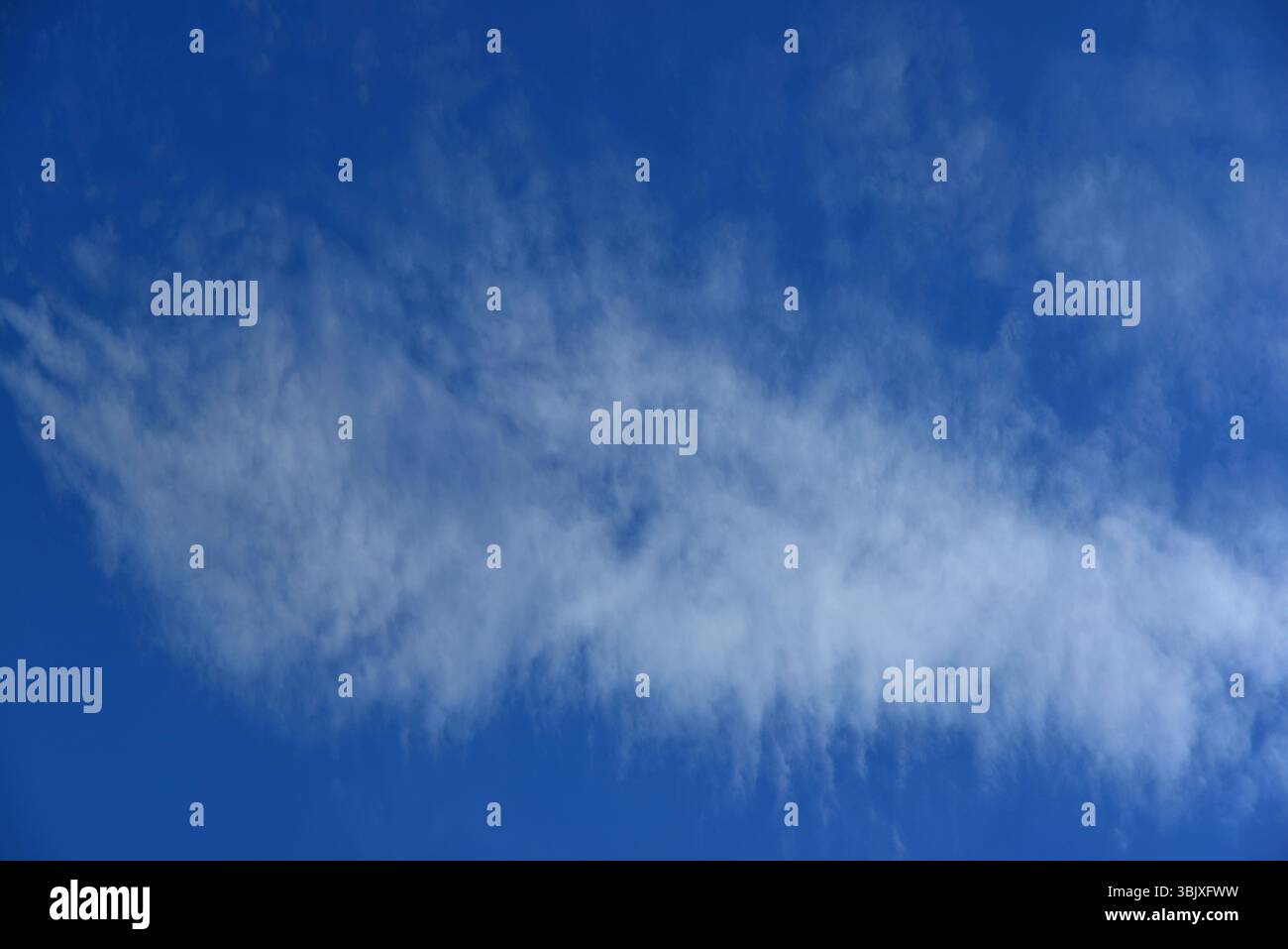 Extraordinary blue sky landscape with some high clouds on spring day ...