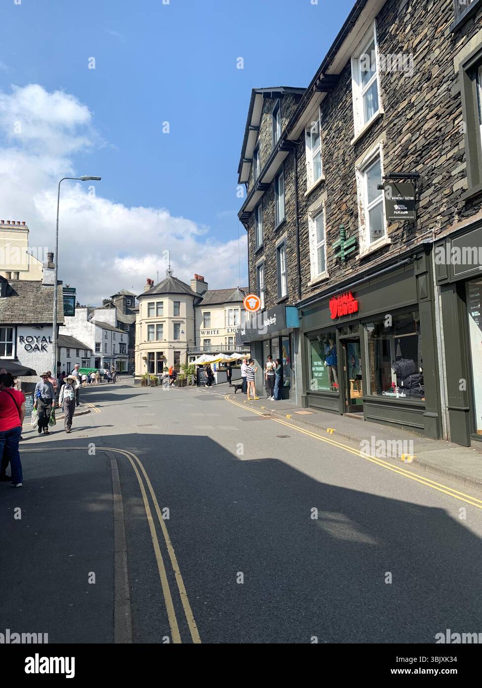 Ambleside Lake District England English lakes British Britain UK houses shop shops games tourists tour old villages outside tourists tourism - Smartphone Captured Stock Image