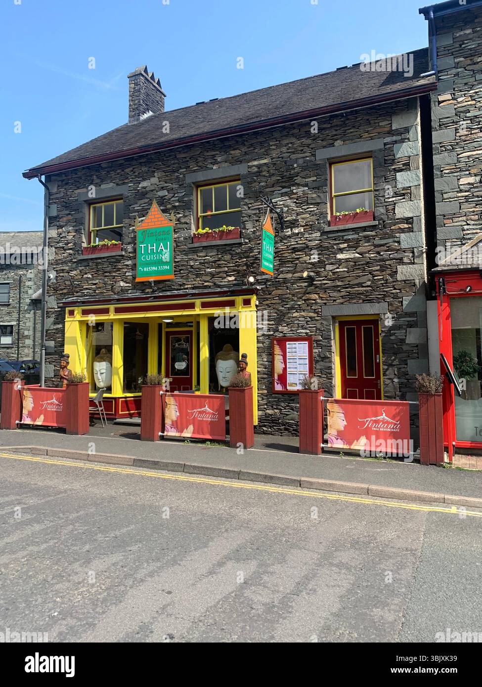 Ambleside Lake District England English lakes British Britain UK houses shop shops games tourists tour old villages outside tourists tourism - Smartphone Captured Stock Image