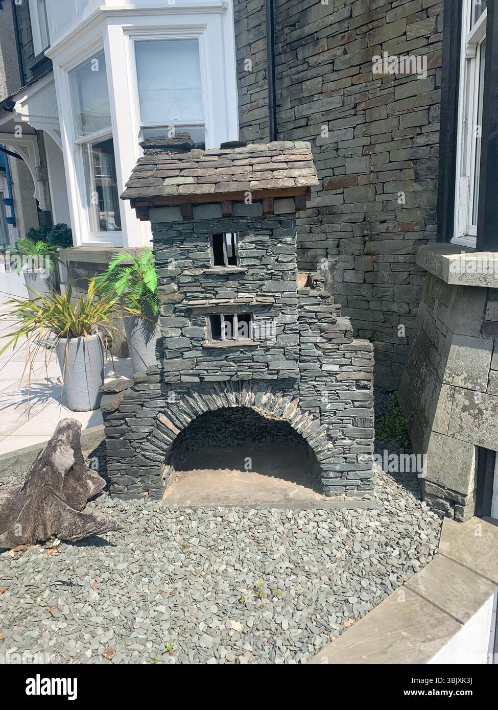 Ambleside Lake District England English lakes British Britain UK houses shop shops games tourists tour old villages outside tourists tourism - Smartphone Captured Stock Image