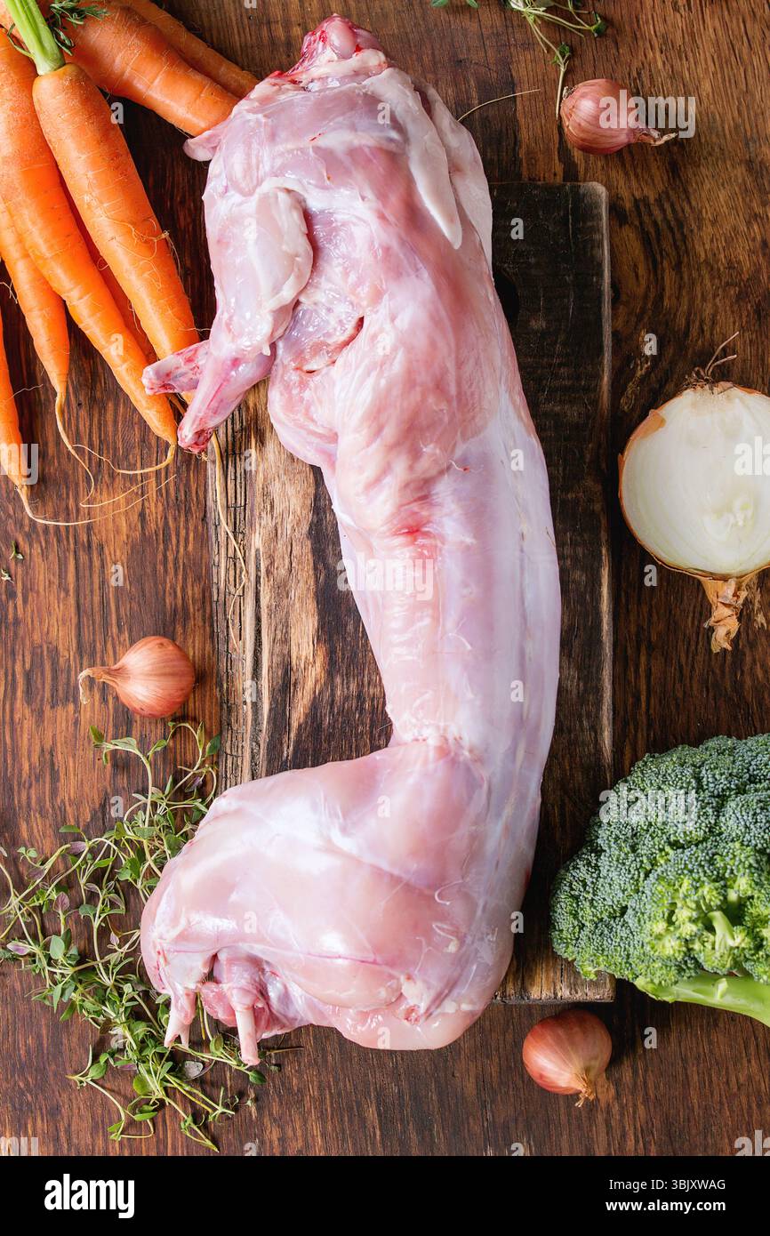 Raw rabbit with vegetables Stock Photo