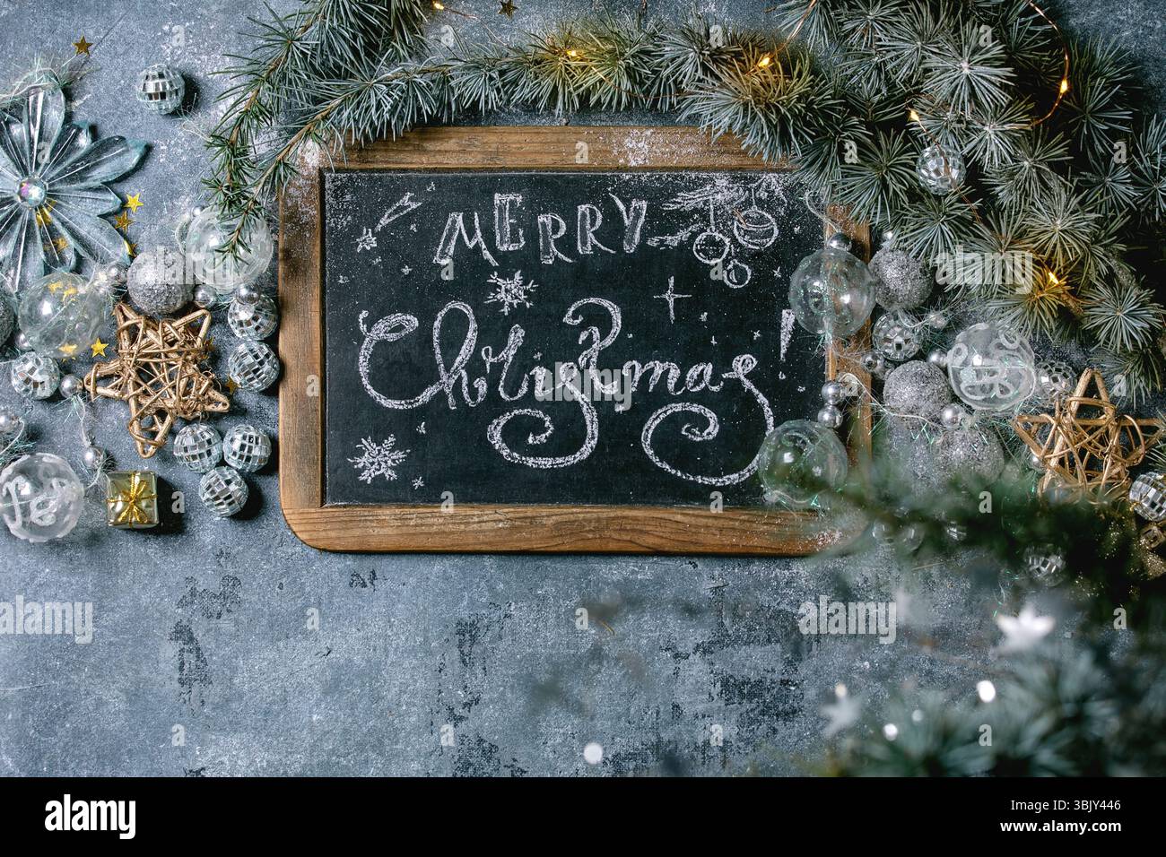 Christmas hand lettering Merry Christmas on vintage chalkboard with fir ...